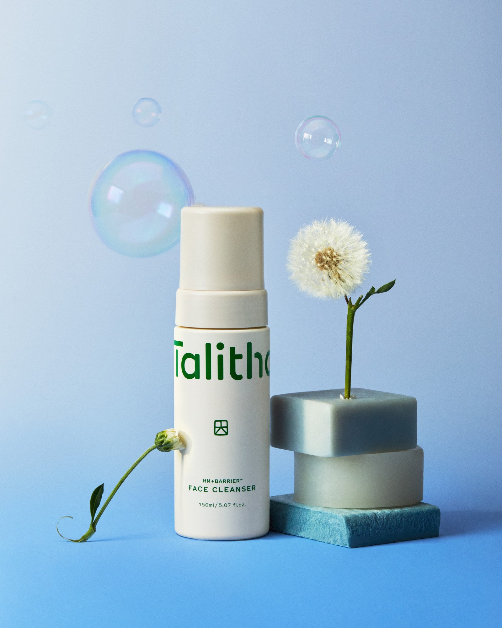 Face Cleanser with White Dandelions against a blue sky