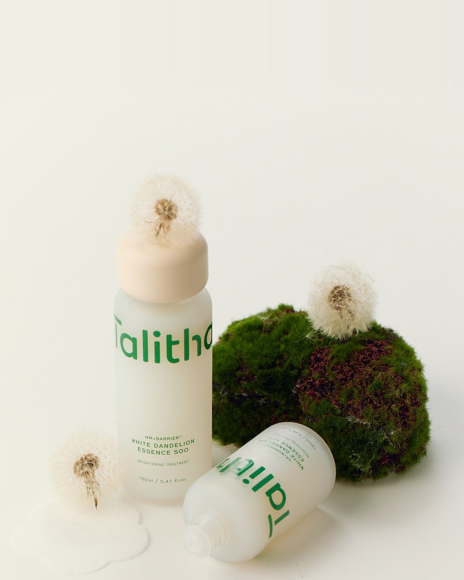 Essence Soo 100ml and 160ml styled with moss and white dandelions
